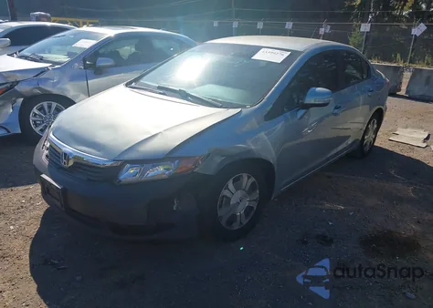 2012 Honda Civic Hybrid z USA, uszkodzony, nr VIN JHMFB4F21CS008409